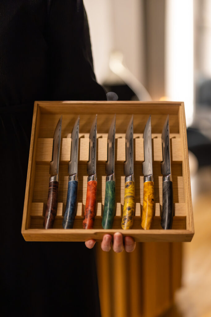Knives presented in a wooden box at Restaurant Syttende